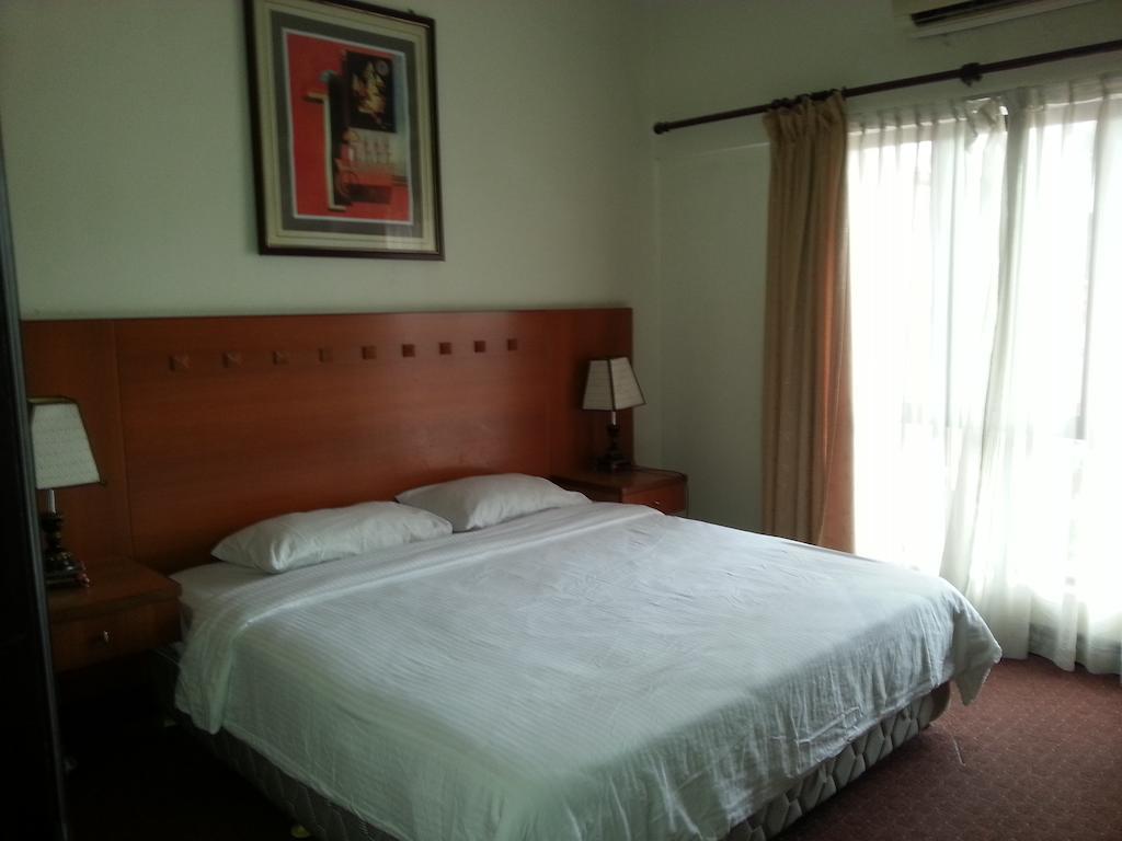 Dorcas Service Apartment - Marina Court Kota Kinabalu Quarto foto