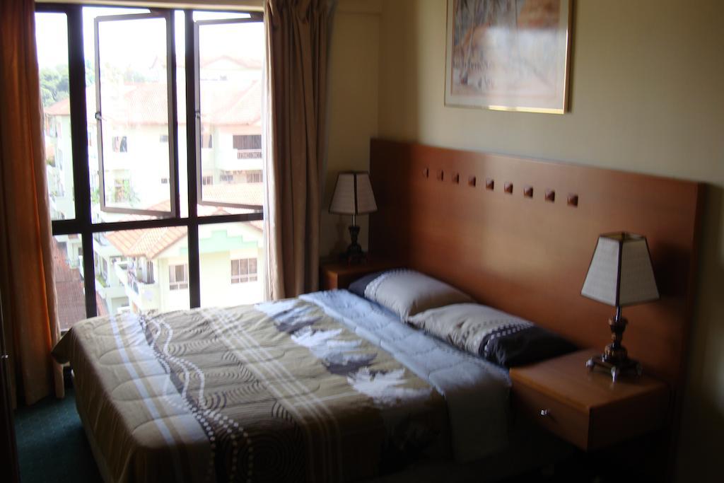 Dorcas Service Apartment - Marina Court Kota Kinabalu Quarto foto