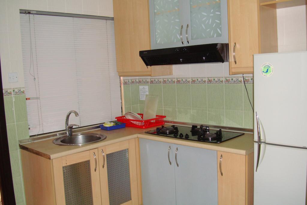Dorcas Service Apartment - Marina Court Kota Kinabalu Quarto foto